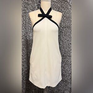 Elegant Cream Halter Dress with Black Trim